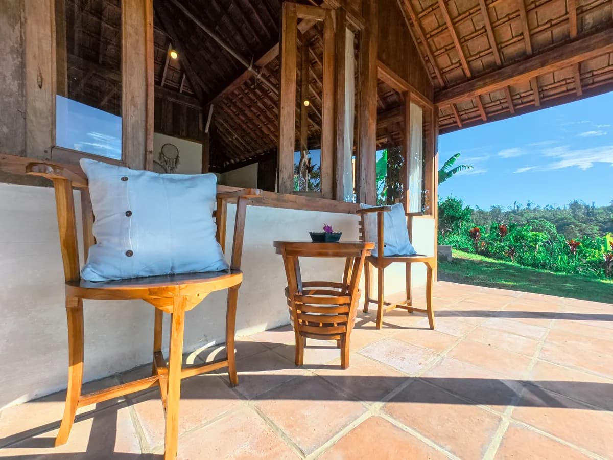 Chairs on the veranda, facing the valley